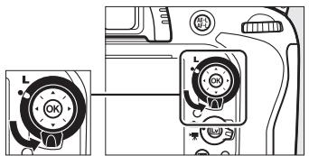 NIKON D610 - Tournier le loquet de verrouillage du sélecteur de mise au point sur . - 1