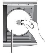 PANASONIC SC-BTX77 - Insérer ou enlever un disque - 1