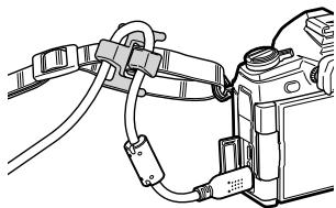 OLYMPUS E-M1 MARK 2 - Fixation du clip de cable - 1