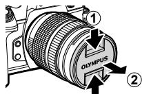 OLYMPUS E-M1 MARK 2 - Retrait du bouchon de l'objectif - 1