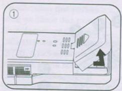 OLYMPUS S711 - Mise en place des piles - 1
