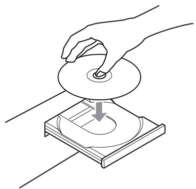 TEAC VRDS-701 - Placez un disque sur le tiroir avec sa face sérigraphie vers le haut. - 1