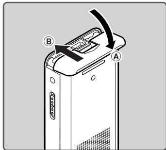 OLYMPUS DM-670 - Insertion des piles - 4