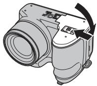 FUJIFILM S2500 - Fermez le couvercle du compartiment des piles. - 1