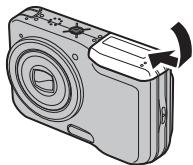 FUJIFILM A100 - Fermez le couvercle du compartment de la batterie. - 1