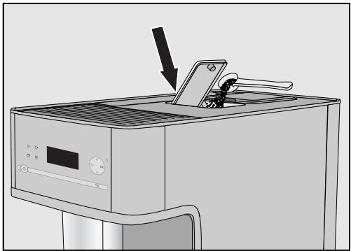 MIELE CM6350GR - Remplir le compartment à café moulu - 1