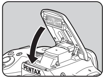 PENTAX K-500 - Appuyez sur le haut du flash pour rétractor le flash incorpore. - 1