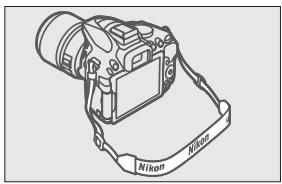 NIKON PACK FD D5300+18-140VR - Fixer la courroie à l'appareil photo (9). - 1