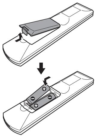 SONY DAV-DZ700FW - Insertion des piles dans la télécommande - 1