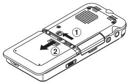 OLYMPUS DM-901 - Insertion de la pile - 1