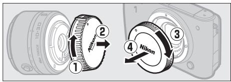 NIKON 1S1BK + 11-27.5 +30-110 - Fixez un objectif. - 1