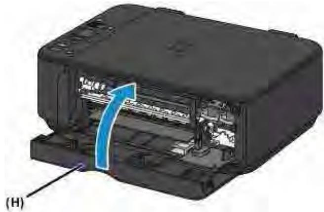 CANON MG2555C - Fermez le couvercle de sortie papier (H). - 1