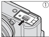 FUJIFILM X-T20 NR + XF 18-55MM - Ouvrez le couvercle du compartment de la batterie. - 1
