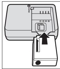 FUJIFILM X-T20 NR + XF 18-55MM - Insérez la batterie dans le chargeur. - 1