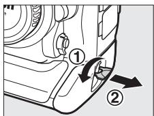 NIKON D4S - Retirer le volet du logement pour accumulateur. - 1