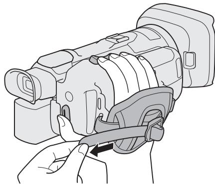 CANON LEGRIA GX10 - Attachez la sangle de poignée. - 1