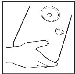 Line drawing of a hand holding a circular object above a curved surface (no text or symbols)