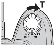 NIKON COOLPIX L320 - Tournez la commande de zoom sur la position T (Q) en mode de visualisation plein écran (28) pour effectuer un zoom sur l'image. - 1