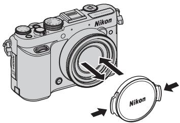 NIKON COOLPIX P7700 - Fixation et retrait du bouchon d'objetif - 1