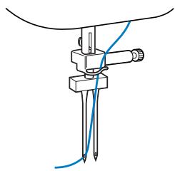 BROTHER INNOVIS 15 - Enfilez manuellement le fil supérieur dans l'aiguille gauche. - 1
