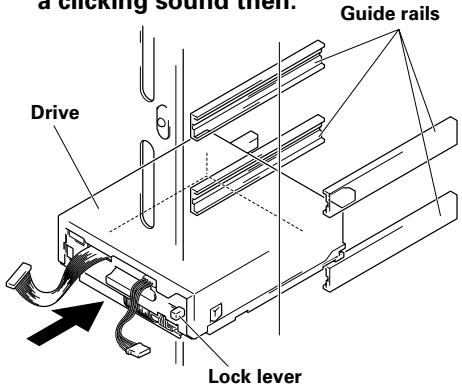 PIONEER DVD-R7783 - When inserting a drive, be sure to place the drive on the changer guide rails and push the drive in until the lock lever on the drive shifts to the locked position. Maybe you can hear a clicking sound then. Guide rails - 1