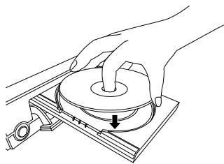 TOSHIBA HD-E 1KE - Placez un disque à l'intérieur de la section creuse avec la face de la lecture orientée vers le bas. - 1