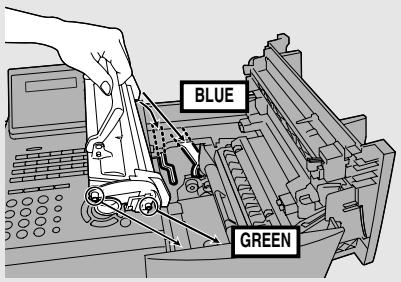 SHARP FO-4470 - Hold the toner cartridge by the handle and insert it into the print compartment. - 1
