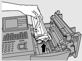 SHARP FO-DC635 - Remove the toner cartridge and place it on a sheet of paper. - 1