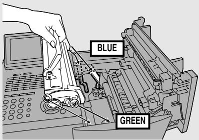 SHARP FO-DC635 - Hold the toner cartridge by the handle and insert it into the print compartment. - 1
