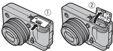 FUJIFILM X-PRO1 - Ouvrez le couvercle du compartiment de la batterie. - 1