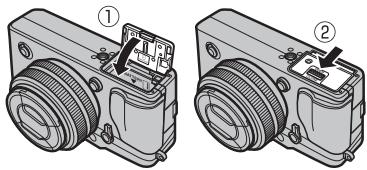 FUJIFILM X-PRO1 - Fermez le couvercle du compartiment de la batterie. - 1