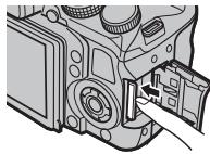 FUJIFILM FINEPIX HS30EXR - Retrait des cartes mémoire - 1