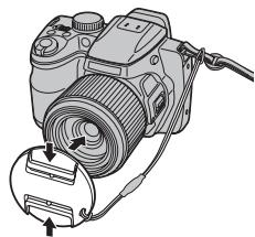 FUJIFILM FINEPIX S8300 - Le capuchon d'objectif - 1