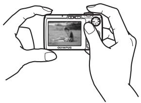 OLYMPUS X820 - a. Hold the camera. - 2