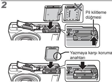 OLYMPUS VR-325 - SD/SDHC bellek kartinin (ayr olarak satilir) takilmasi - 2