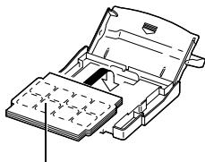 CANON CP-300 - Fan the paper stack properly and place the paper into the paper cassette, with the printable side (glossy side) facing up. - 2
