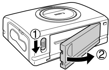 CANON CP-300 - Remove the battery pack's terminal cover. - 1