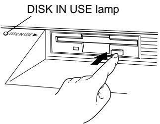 YAMAHA CVP-109-107-105-700 - To insert a floppy disk into the disk drive: - 2