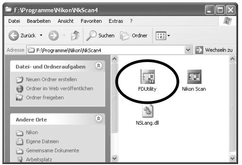 NIKON CHARGEUR 50 DIAPOSITIVES SF-210 - Beseitigen eines Diastaus - 1