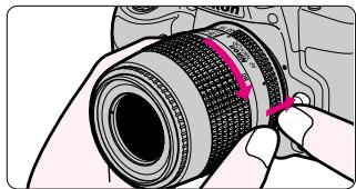 NIKON F60D - Detaching the lens. - 1