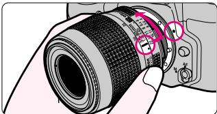 NIKON F60D - Turn the main switch off and mount lens to the camera body. - 2