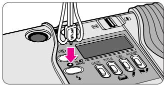 Diagram showing a device with labeled buttons and a warning icon, likely indicating status or operation.