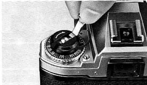 NIKON FG - At the end of the roll, push the rewind button 34. - 1