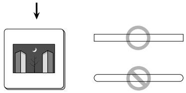 Diagram showing a window with moon and tree, followed by two horizontal bars with circular and non-concentric symbols.