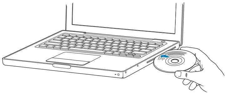 APPLE MACBOOK 13-INCH - Inserting a CD or DVD Disc - 1