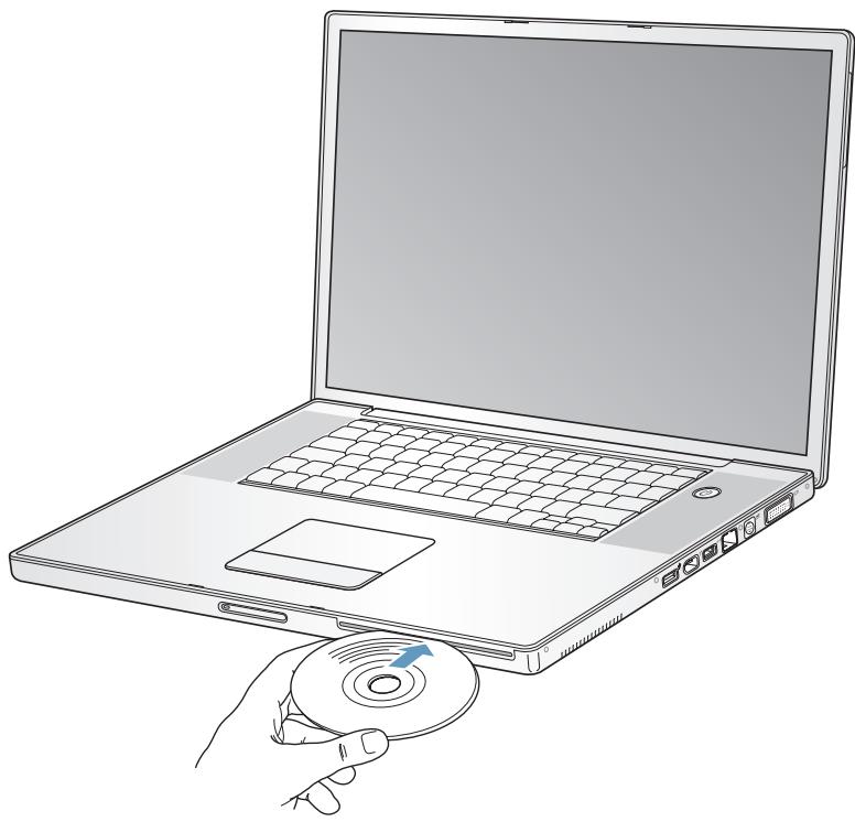 APPLE POWERBOOK G4 17-INCH - Inserting a CD or DVD Disc - 1