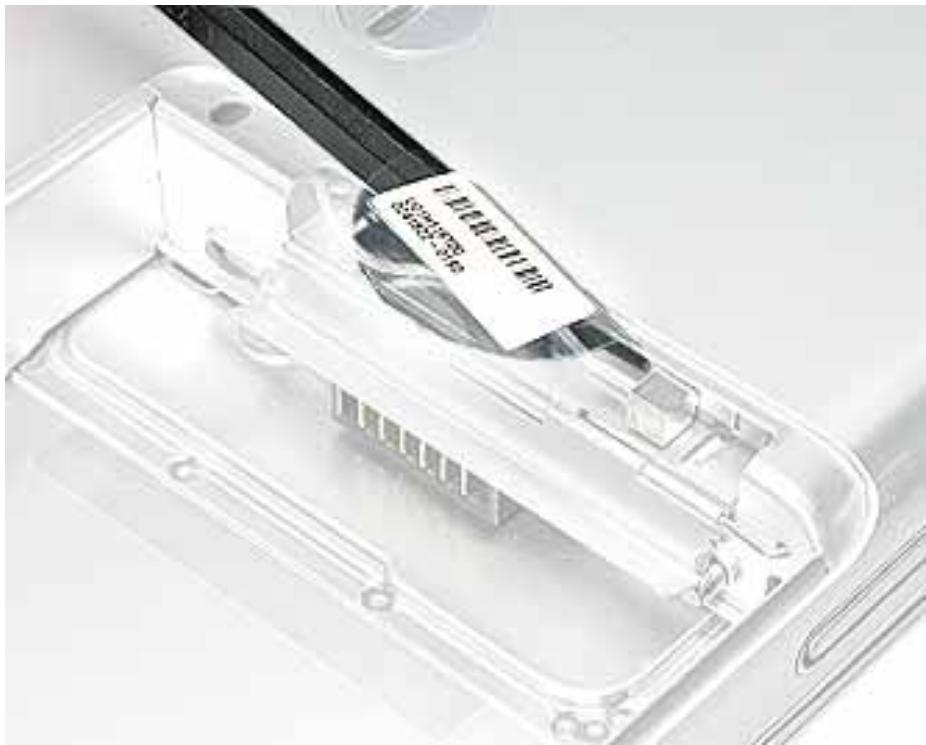 APPLE POWERBOOK G4 12 INCH - Open the door to the AirPort slot. (Figure 3) - 2