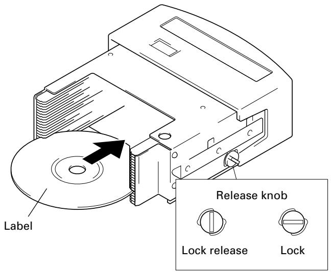 PIONEER DRM-7000 - Insert discs into a 20-disc hyper magazine and insert the magazine into the changer. - 1