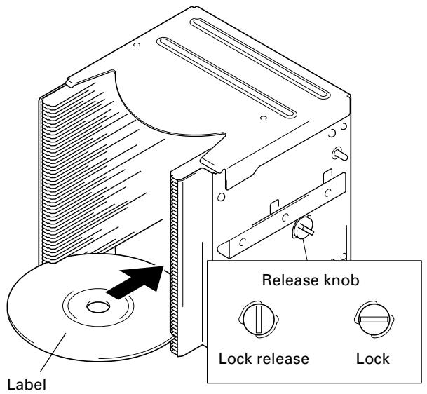 PIONEER DRM-7000 - Insert discs into a normal-type 50-disc magazine and insert the magazine into the changer. - 1