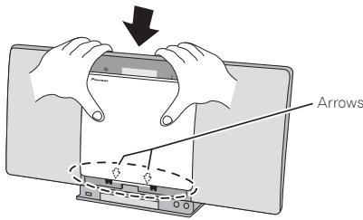 PIONEER X-SMC00 - Align the line below the arrow and the bottom of the changeable panel, then slide downward using both hands until you hear a clicking sound. - 1